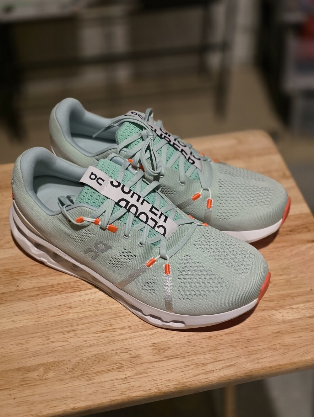 On Cloud Mint Green Running Shoes with Coral Accents
